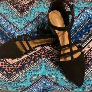 Size 10 pointed black flats from Maurice’s.